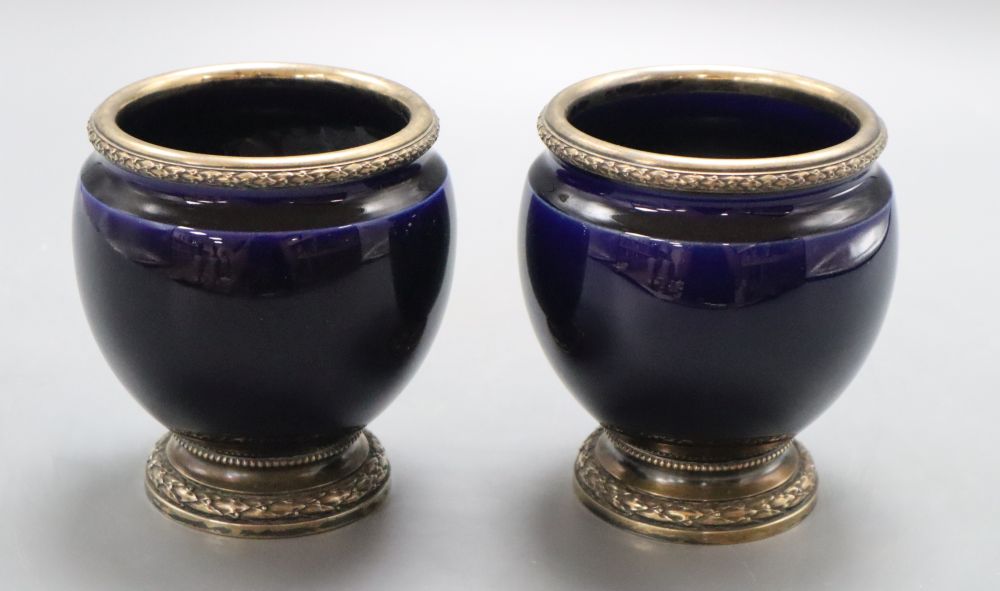 A pair of Risler & Carre silver mounted blue glazed squat vases, height 11cm